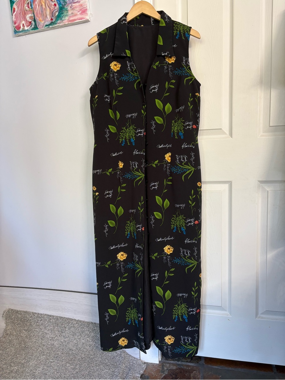 Sleeveless Black Floral dress with Green Leaf Print